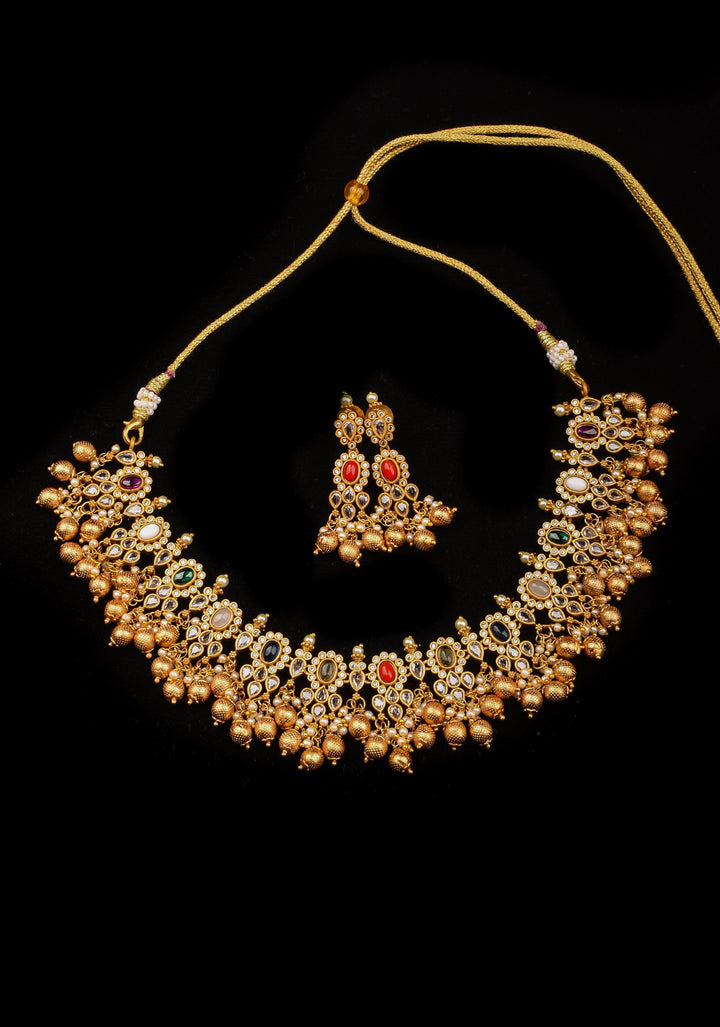 Antique matte gold finished Multicolored stones necklace set with matching Earrings
