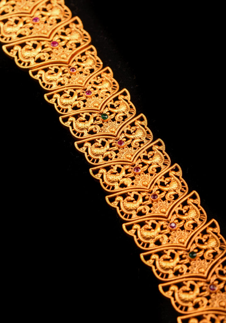 Antique jada billai lakshmi and peacock design with Red and Green stones and gold bead hanging | Shobitam jewelry