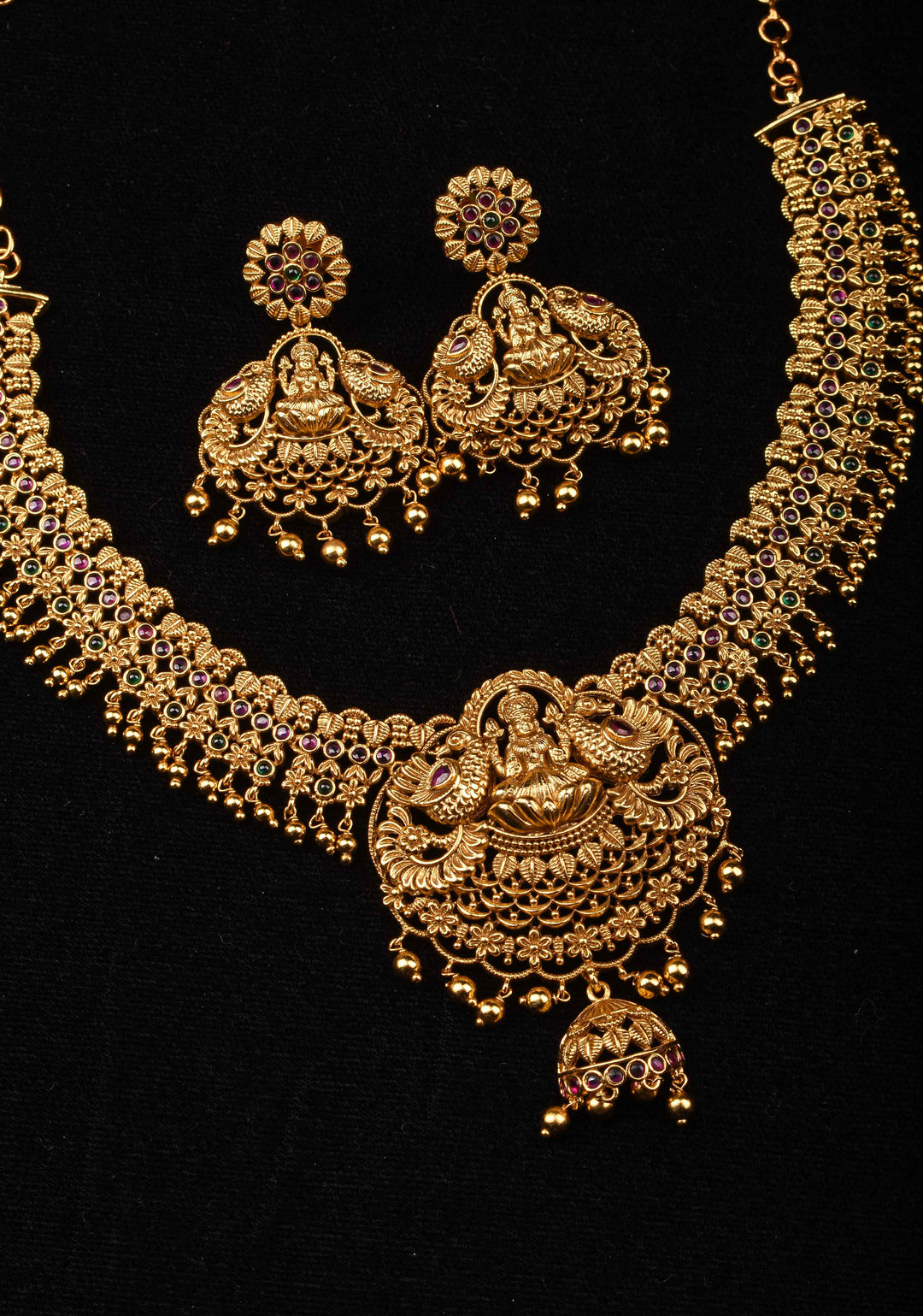 Antique Finish Necklace Set with Lakshmi Peacock and Stone Embellishments