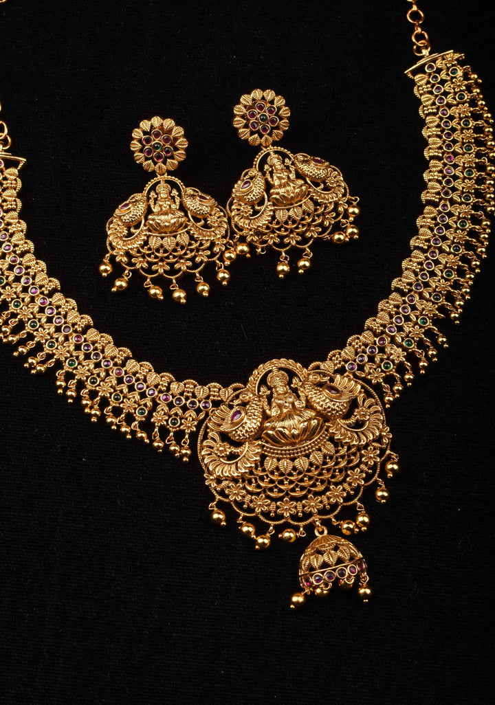 Antique Finish Necklace Set with Lakshmi Peacock and Stone Embellishments