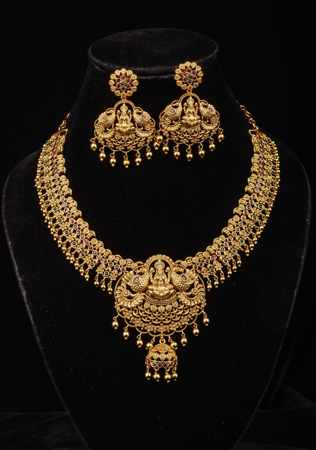 Antique Finish Necklace Set with Lakshmi Peacock and Stone Embellishments