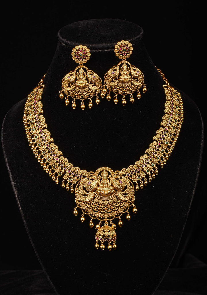 Antique Finish Necklace Set with Lakshmi Peacock and Stone Embellishments