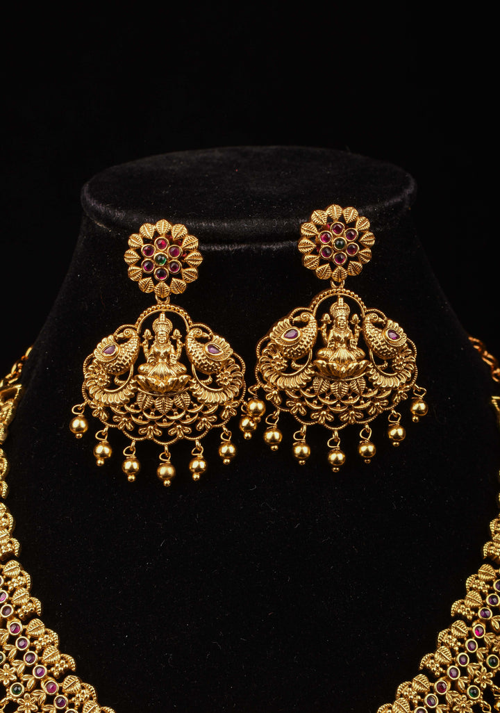 Antique Finish Necklace Set with Lakshmi Peacock and Stone Embellishments