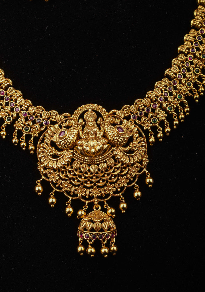 Antique Finish Necklace Set with Lakshmi Peacock and Stone Embellishments