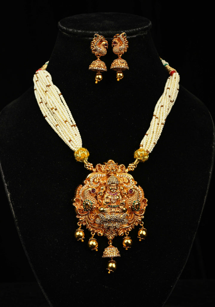 White Multistrand Beads Necklace Set with Lakshmi Pendant