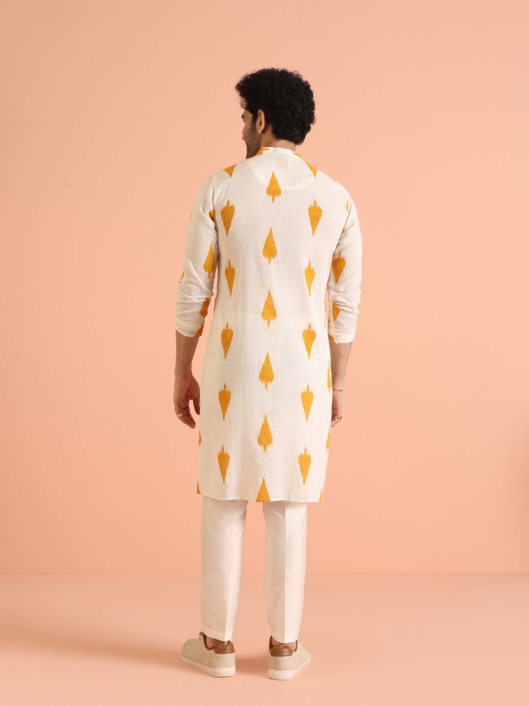 White Cotton Kurta Set with Mustard Ikat-Inspired Prints and Cream Trousers – Festive & Wedding Ensemble | SHOBITAM