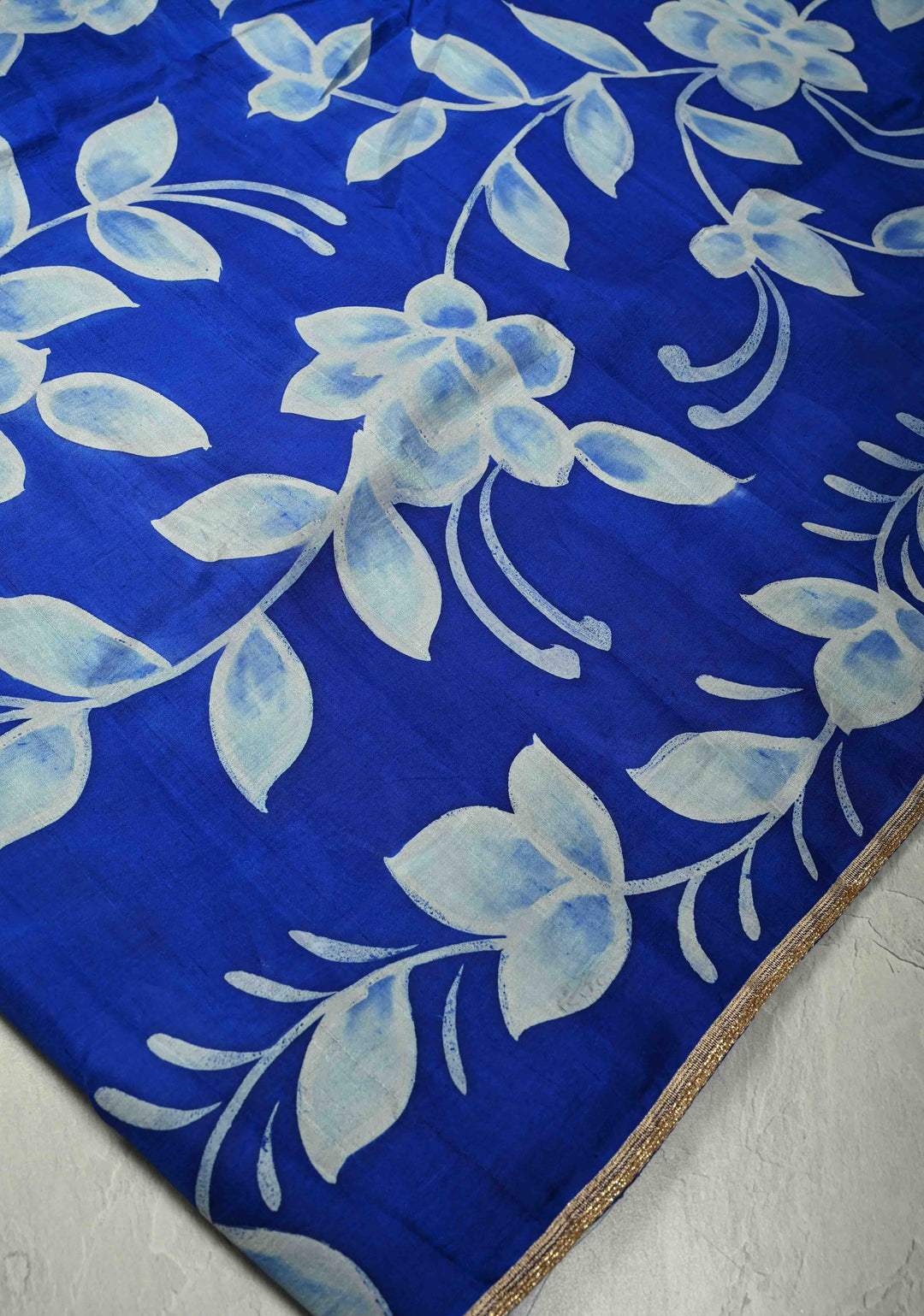 Sapphire Blue Hand Wax Batik Print on Lightweight Tussar Silk Saree with Floral Design and Lace Border | SILK MARK CERTIFIED