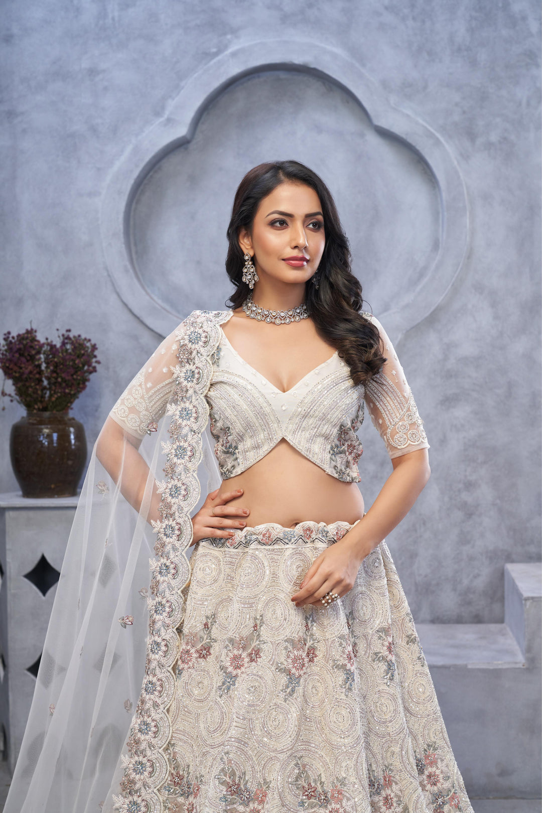 Ivory Elegance Embroidered Net Lehenga