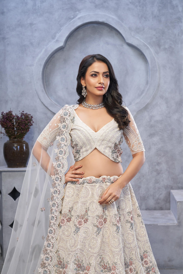 Ivory Elegance Embroidered Net Lehenga
