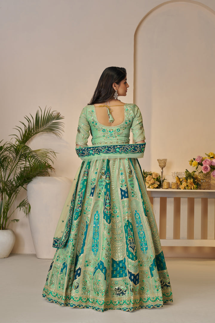 Vantara Patchwork Banarasi Lehenga in Emerald Green
