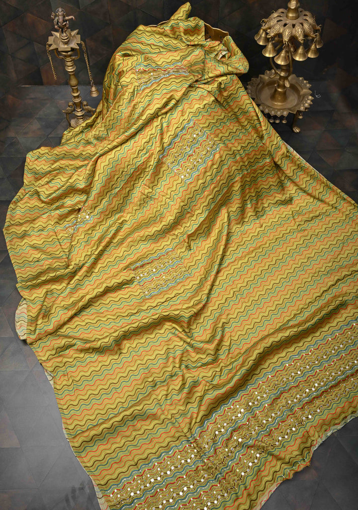 Greenish Yellow Crepe Georgette Silk Saree with Zigzag Digital Print, Sequins, Cutdana, Mirror work and Hand embroidery