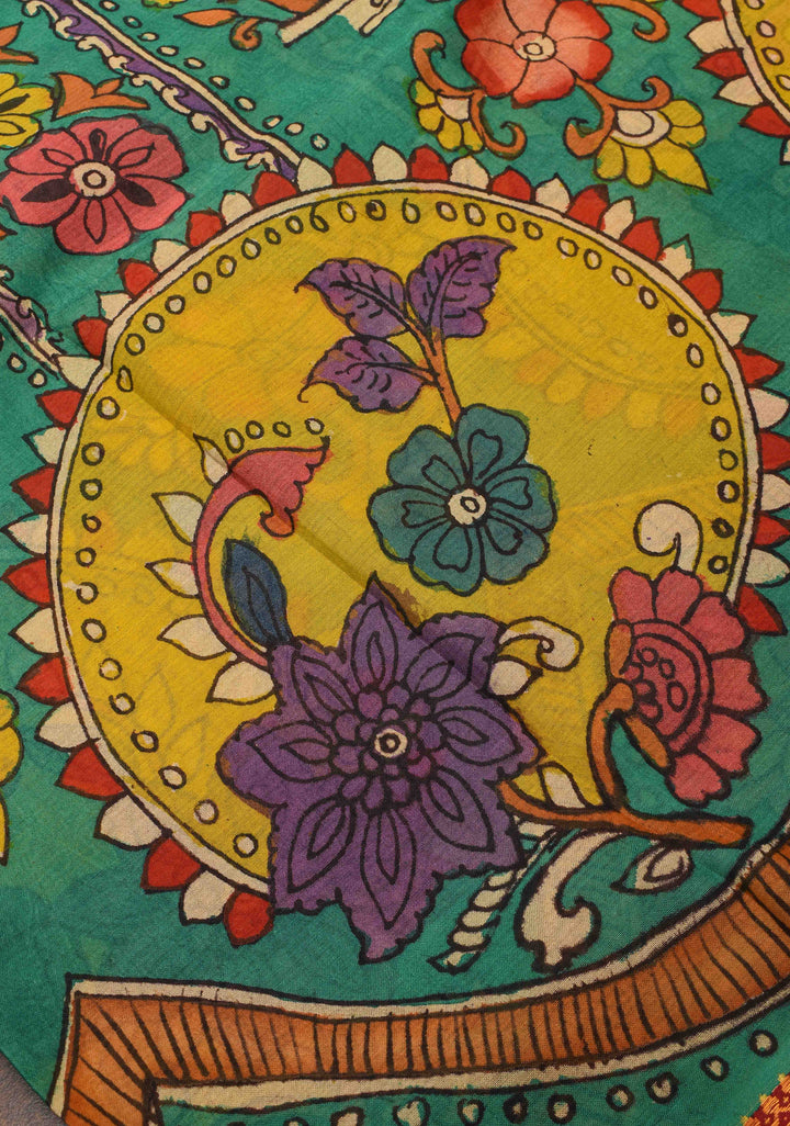 Floral Theme : Teal Authentic Pen kalamkari on pure Chennuri Silk Saree with zari border and Peacock motif on Pallu