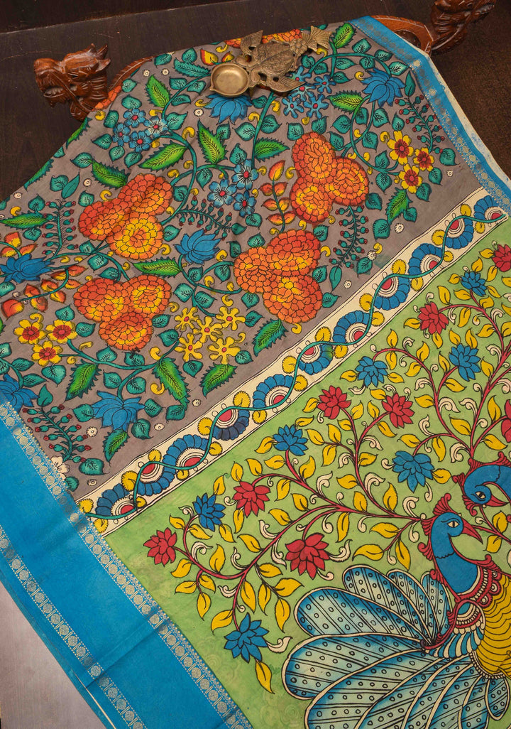 Floral and Peacock Theme : Grey Authentic Pen kalamkari on pure Chennuri Silk Saree with Border