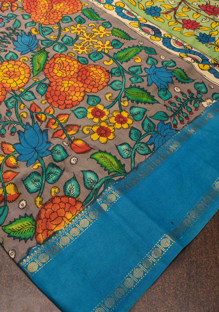 Floral and Peacock Theme : Grey Authentic Pen kalamkari on pure Chennuri Silk Saree with Border