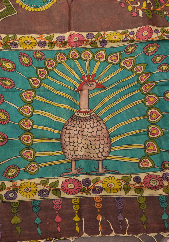 Floral Theme : Brown Authentic Pen kalamkari on Bangalore Silk Saree with zari border and Peacock motif on Pallu