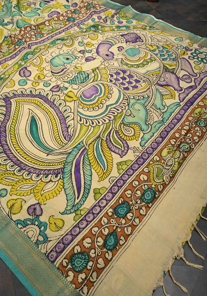Annapakshi and Floral Theme : Beige Authentic Pen kalamkari on Mangalagiri Silk Saree with Zari Border