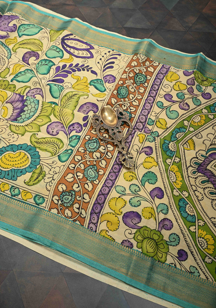 Annapakshi and Floral Theme : Beige Authentic Pen kalamkari on Mangalagiri Silk Saree with Zari Border