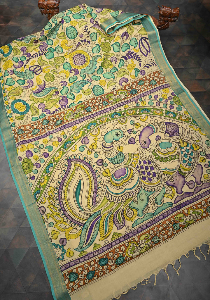 Annapakshi and Floral Theme : Beige Authentic Pen kalamkari on Mangalagiri Silk Saree with Zari Border