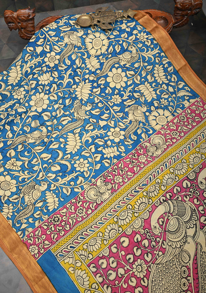 Peacock and Floral Theme : Blue Authentic Pen kalamkari on Mangalagiri Silk Saree with Zari Border