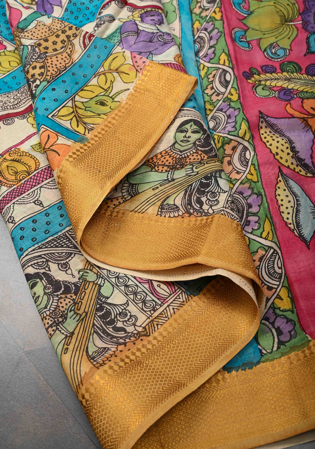 Musician Theme: Blue Authentic Pen kalamkari on Mangalagiri Silk Saree with Zari Border