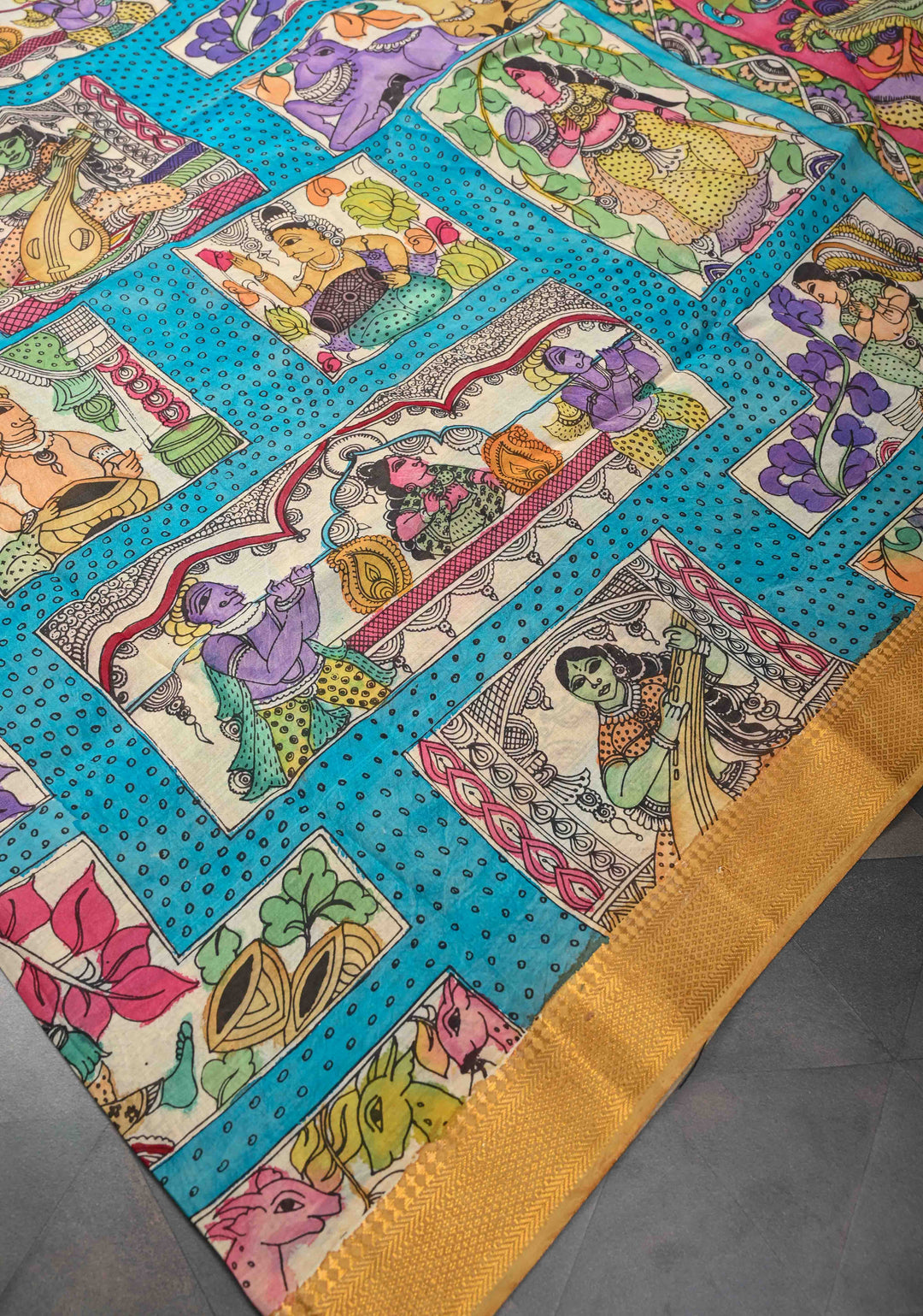 Musician Theme: Blue Authentic Pen kalamkari on Mangalagiri Silk Saree with Zari Border