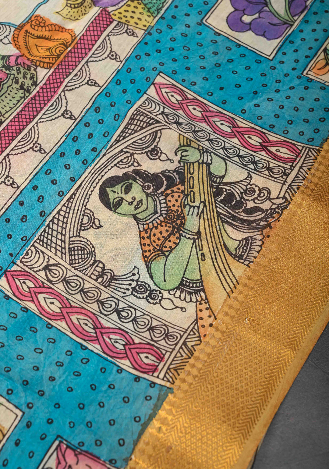 Musician Theme: Blue Authentic Pen kalamkari on Mangalagiri Silk Saree with Zari Border