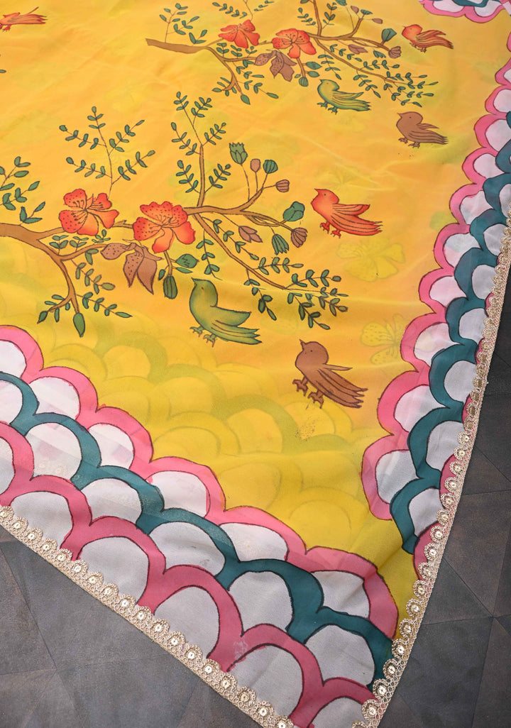 Floral and Birds Theme : Yellow Authentic pen kalamkari on pure Georgette Silk Saree with Lace Border | SILK MARK CERTIFIED