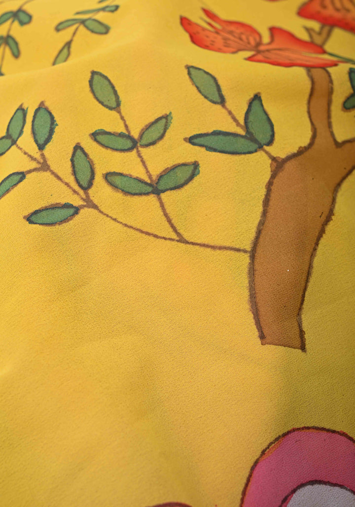Floral and Birds Theme : Yellow Authentic pen kalamkari on pure Georgette Silk Saree with Lace Border | SILK MARK CERTIFIED