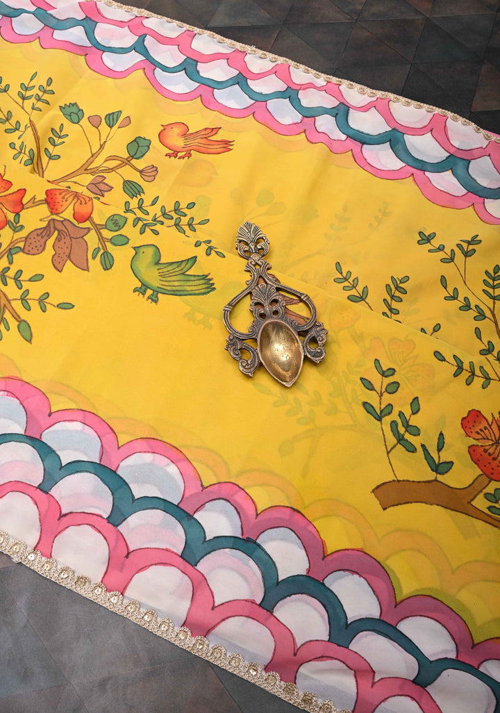 Floral and Birds Theme : Yellow Authentic pen kalamkari on pure Georgette Silk Saree with Lace Border | SILK MARK CERTIFIED