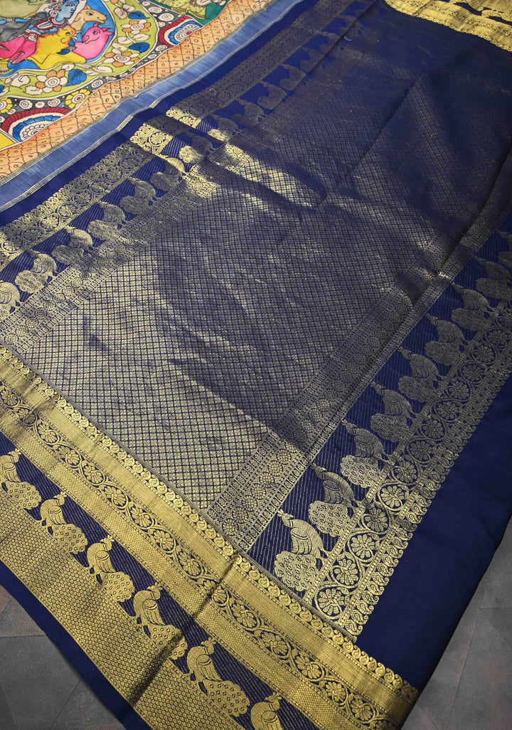 Krishna and Pichwai Theme :  Authentic Green Pen kalamkari on Pure Kanjivaram Silk Saree with Navy Contrast base Zari Border | SILK MARK CERTIFIED
