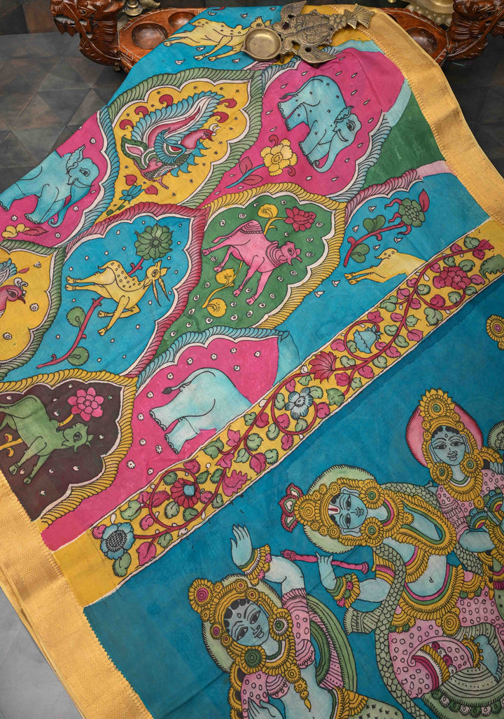 Dancing Radha Krishna With Animals Theme: Authentic Pen kalamkari on Mangalagiri Silk Saree with Zari Border