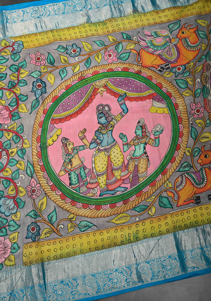 Krishna and Pichwai Theme :  Authentic Gray Pen kalamkari on Pure Kanjivaram Silk Saree with Azure Blue Contrast base Zari Border | SILK MARK CERTIFIED