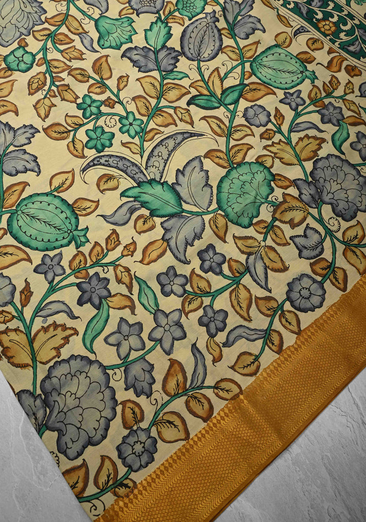 Floral Theme: Authentic Pen kalamkari on Mangalagiri Silk Cotton  Saree with Zari Border