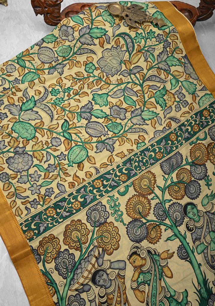 Floral Theme: Authentic Pen kalamkari on Mangalagiri Silk Cotton  Saree with Zari Border