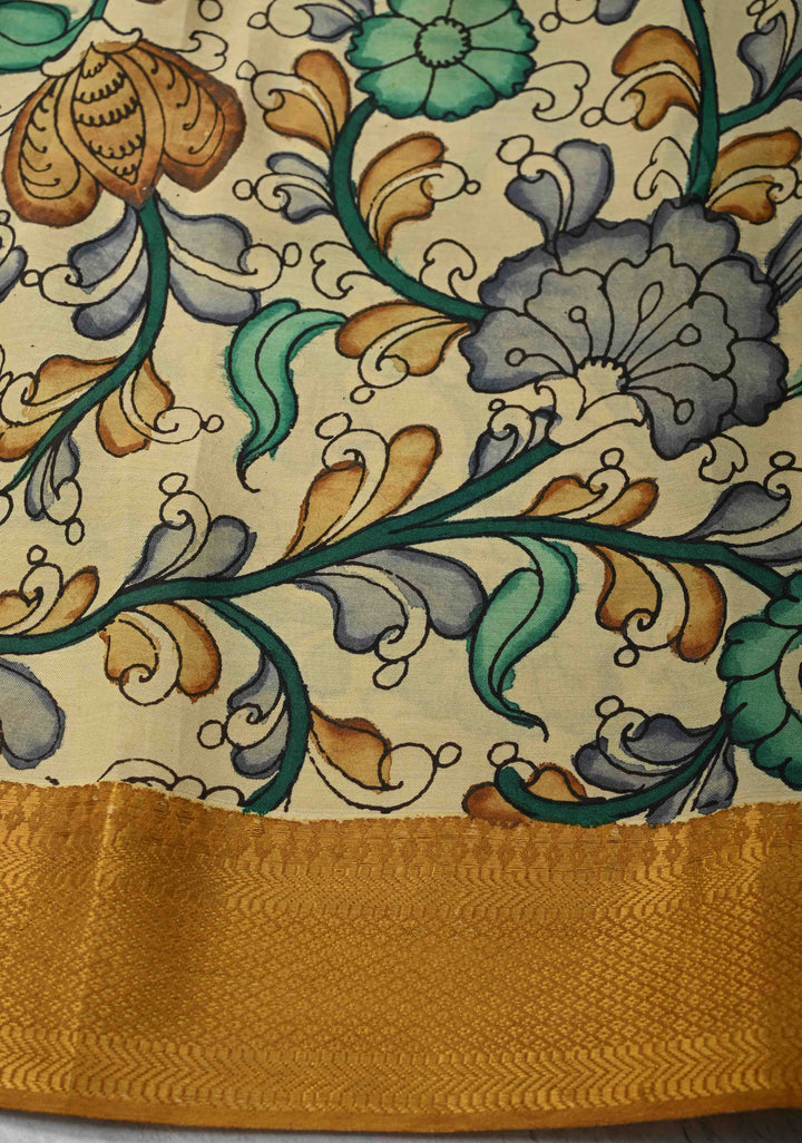Floral Theme: Authentic Pen kalamkari on Mangalagiri Silk Cotton  Saree with Zari Border
