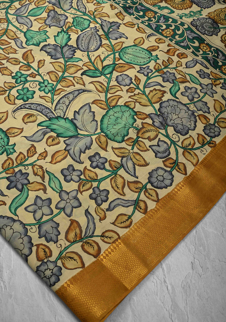 Floral Theme: Authentic Pen kalamkari on Mangalagiri Silk Cotton  Saree with Zari Border