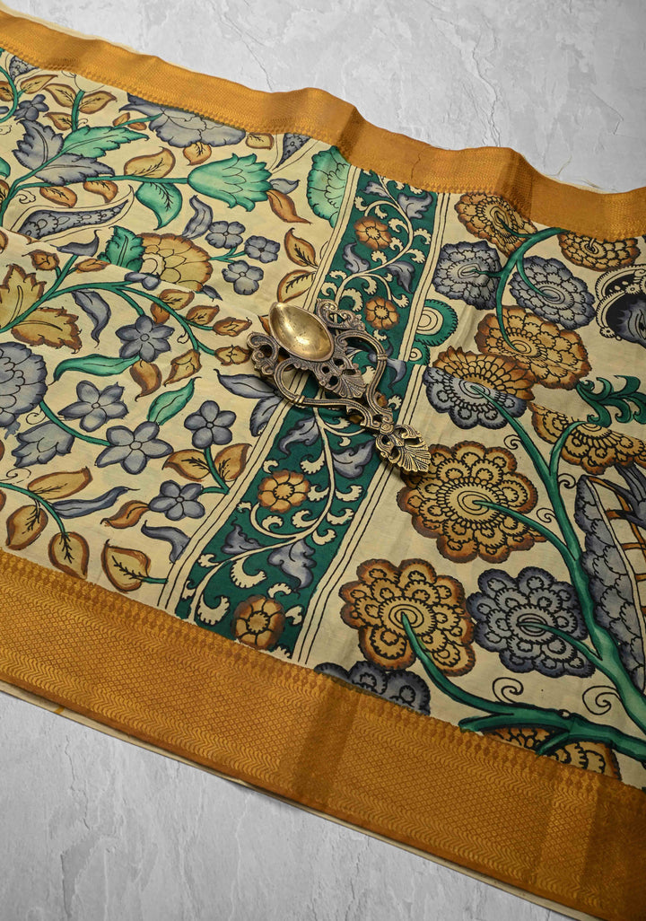 Floral Theme: Authentic Pen kalamkari on Mangalagiri Silk Cotton  Saree with Zari Border