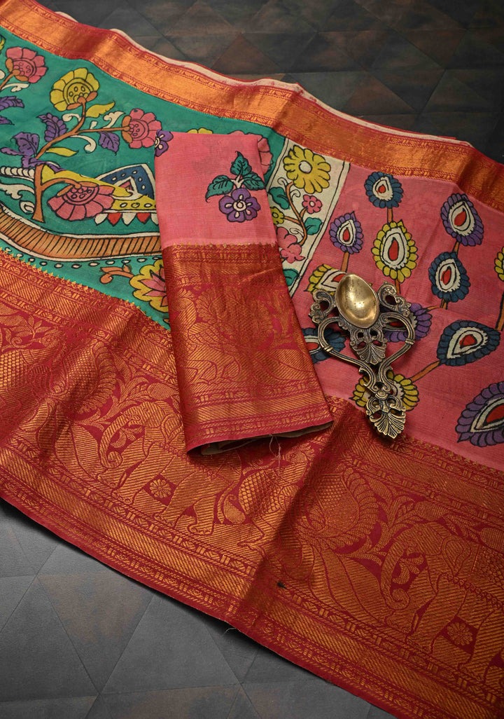 Floral and Peacock Theme : Green Authentic Pen kalamkari on Pure Chennuri Silk Saree with Wide Zari Border