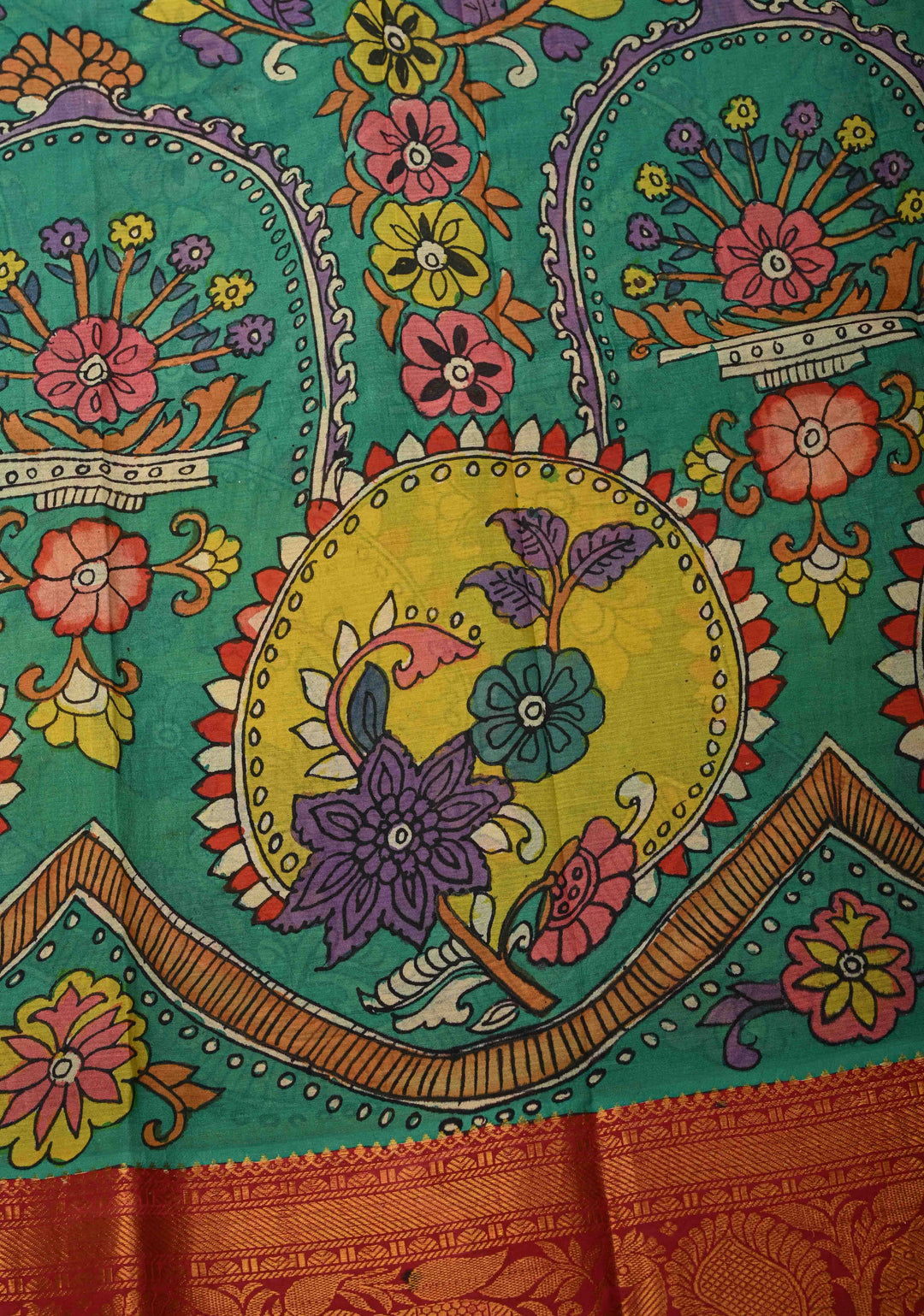 Floral and Peacock Theme : Green Authentic Pen kalamkari on Pure Chennuri Silk Saree with Wide Zari Border