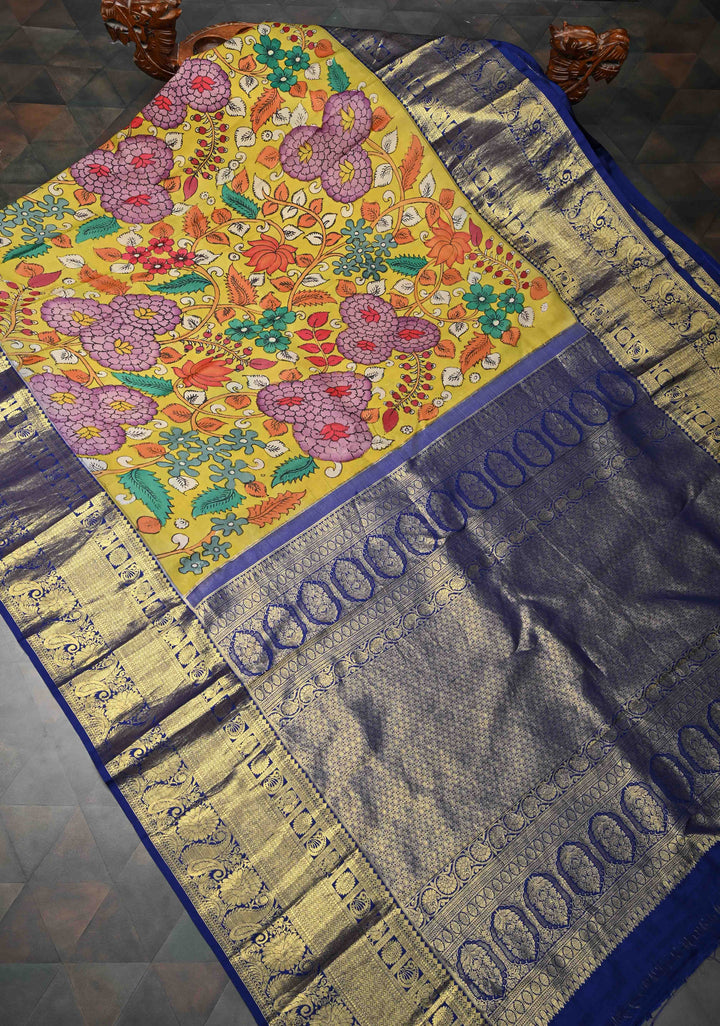 Floral Theme : Yellow Authentic Floral Brocade Pen kalamkari on Kanjivaram Silk Saree with Zari Border | SILK MARK CERTIFIED