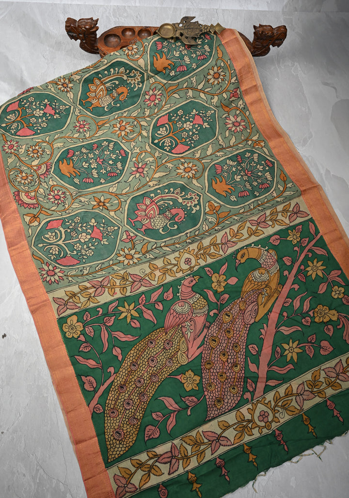 Floral Theme: Sage Green Authentic Pen kalamkari on Mangalagiri Silk Cotton  Saree with Zari Border
