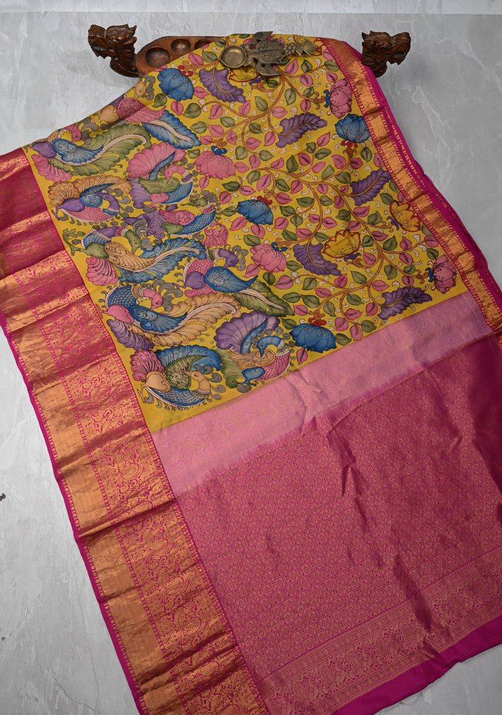 Floral Theme :  Yellow Authentic Pen kalamkari on Kanjivaram Silk Saree with Zari Border | SILK MARK CERTIFIED