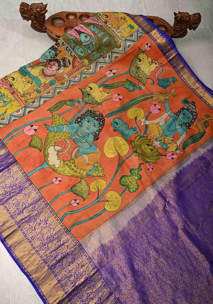 Balakrishna Pichwai Theme : Rust Orange Authentic Pen Kalamkari on Pure Kanjivaram Silk Saree with Wide Zari Border | SILK MARK CERTIFIED