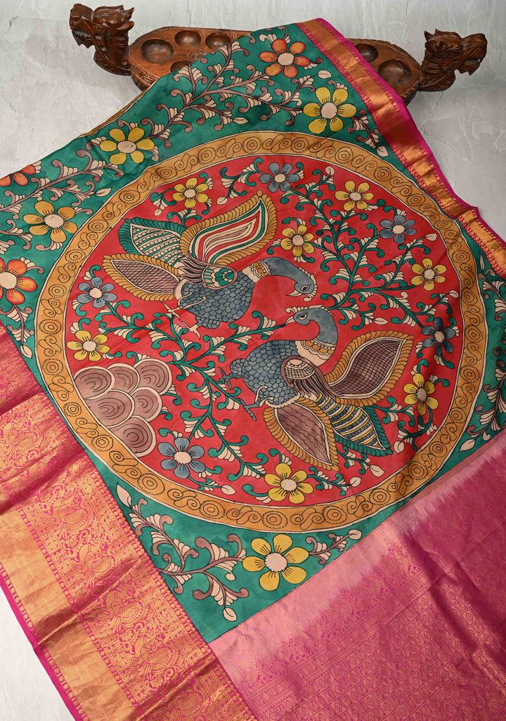 Floral-Peacock in Extra Large Mandala Theme : Rama Green Authentic Pen Kalamkari on Pure Kanjivaram Silk Saree with Wide Kanjivaram Pink Border | SILK MARK CERTIFIED