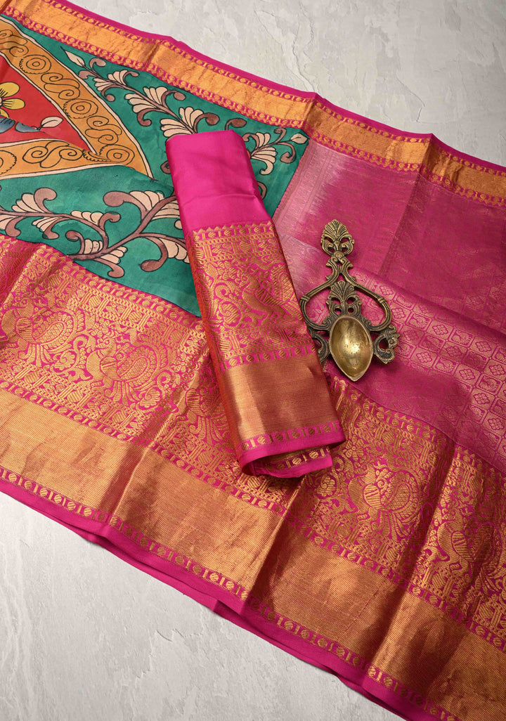 Floral-Peacock in Extra Large Mandala Theme : Rama Green Authentic Pen Kalamkari on Pure Kanjivaram Silk Saree with Wide Kanjivaram Pink Border | SILK MARK CERTIFIED