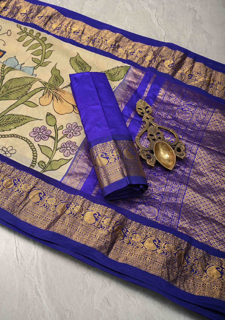 Tropical Paradise Blooms and Floral Theme : Beige Authentic Pen Kalamkari on Pure Kanjivaram Silk Saree with Wide Zari Border | SILK MARK CERTIFIED