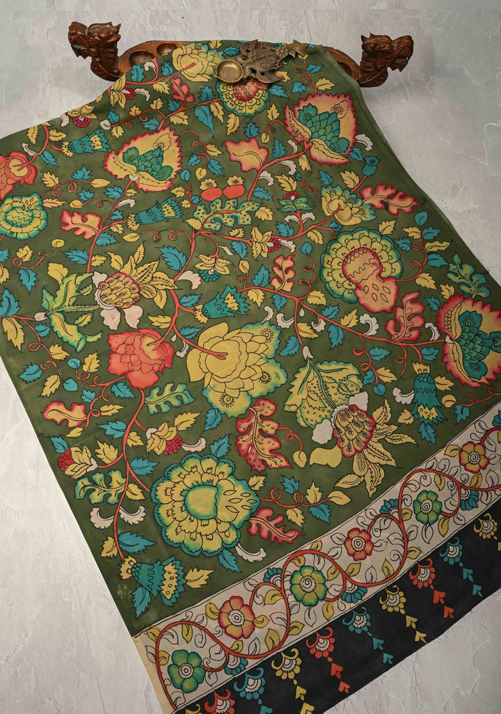 Floral Theme : Mehendi Green Authentic Pen Kalamkari on Banarasi Pure Georgette Saree with Lace Trim Border | SILK MARK CERTIFIED