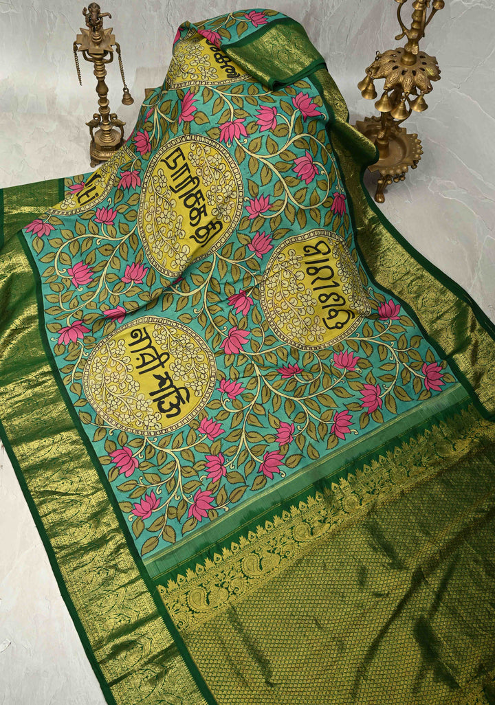 Nari Shakti and Floral Theme  : Turquoise Authentic Pen Kalamkari on Pure Kanjivaram Silk Saree with Bottle Green Zari Border | SILK MARK CERTIFIED