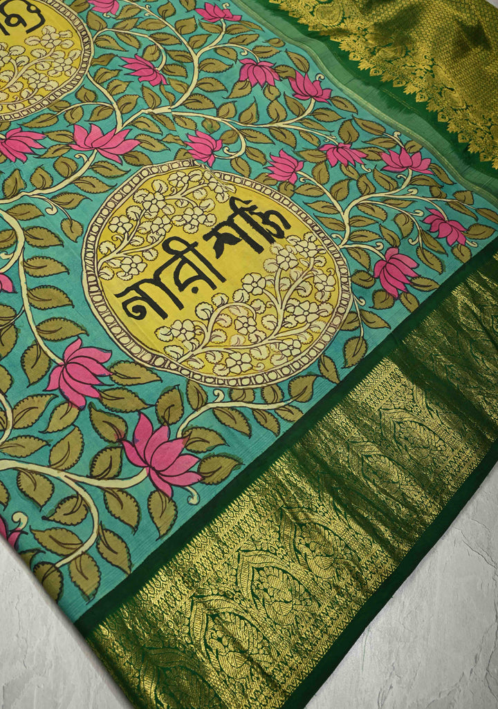 Nari Shakti and Floral Theme  : Turquoise Authentic Pen Kalamkari on Pure Kanjivaram Silk Saree with Bottle Green Zari Border | SILK MARK CERTIFIED