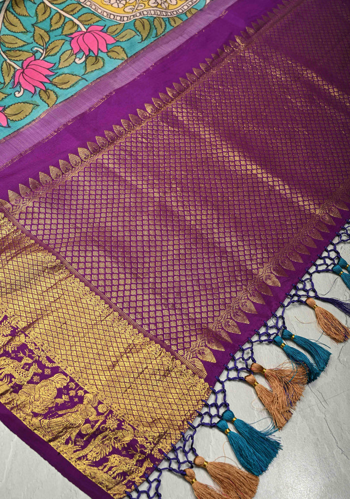 Dupatta: Turquoise Authentic Pen Kalamkari Hand Painted on Kanjivaram Pure Silk Dupatta with Nari Shakti Theme and Purple Zari Border | SILK MARK CERTIFIED